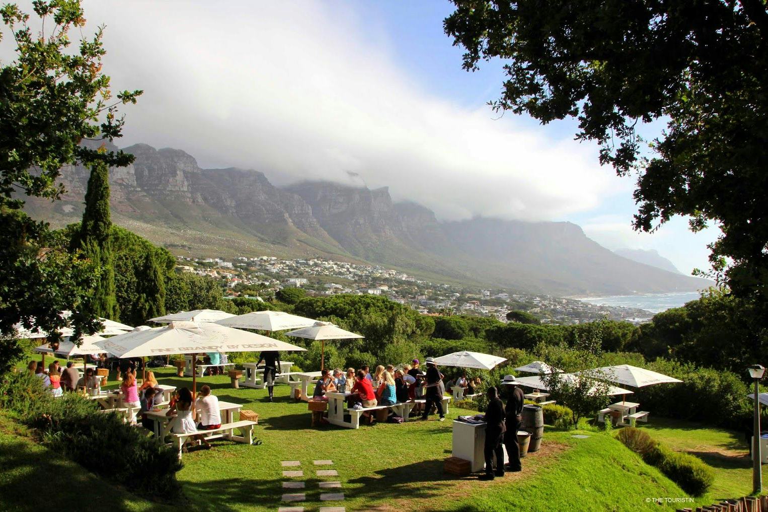 Dine in style as you overlook the Twelve Apostles and Camps Bay Beach